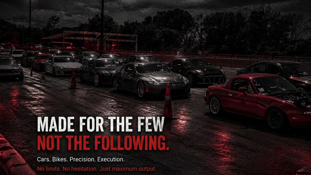 Dark parking lot with cars and text overlay 'Made for the Few Not the Following' at night.